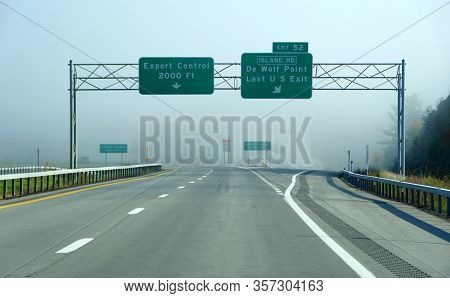 Wellesley Island, New York, U.s.a - October 25, 2019 - A Foggy Highway Near The Last Exit Into The C
