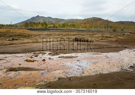 Landscape With Red Soil Polluted Copper Mining Factory In Karabash, Russia, Chelyabinsk Region