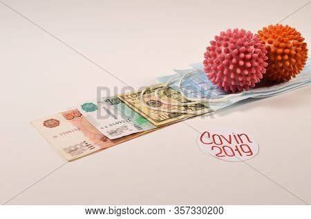 Balloons With Spikes - A Symbol Of Coronavirus And Medical Masks Pressed Money From Different Countr