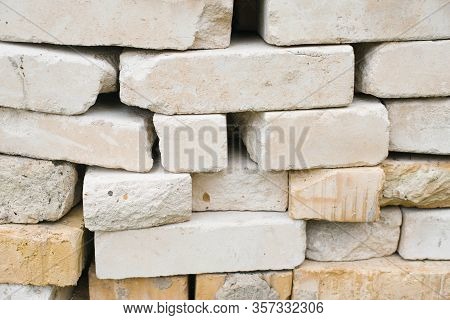 Bricks Of Different Sizes And Textures, Background Of Stacked Bricks