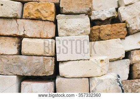 Bricks Of Different Sizes And Textures, Background Of Stacked Bricks