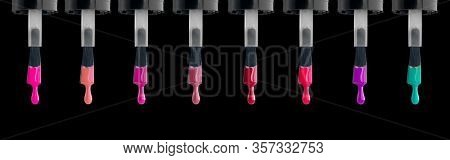 Nail polish. Colorful various nailpolish drops on brush, isolated on black background. Fashion beautiful nail art, Design of female colourful nailart, Dripping colored UV nail varnish.