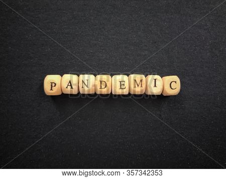 Global Health And Safety Issue. Pandemic Written On Wooden Blocks. Vintage Styled Background.
