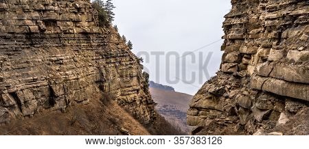 Rocks On Two Sides With A View Of The Plain