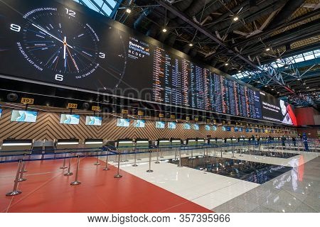 Moscow, Russia - 2020: Sheremetyevo International Airport, Flight Information Monitors And Check-in.