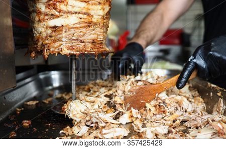 Close-up Meat On Special Equipment, Cook Shawarma. Modern Equipment For Street Trading. Opening Succ