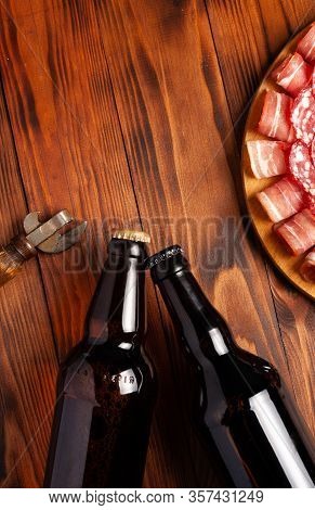 Beer Snack In The Form Of Meat Products And Bottled Beer. Appetizer In The Form Of Slicing Bacon, Sa