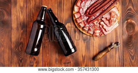 Beer Snack In The Form Of Meat Products And Bottled Beer. Appetizer In The Form Of Slicing Bacon, Sa