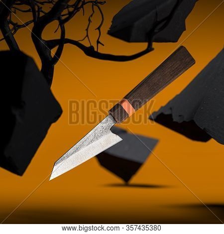 Brand New Damascus Steel Japanese Kitchen Knife On Yellow Background. Sharp High Quality Chef Knife.