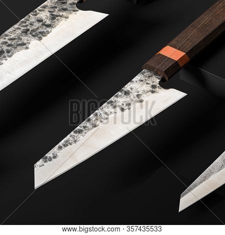 Close Up Of High Quality Japanese Knifes Blades On Dark Minimalistic Background. Damascus Steel Chef