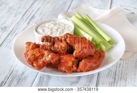 Bowl Of Buffalo Wings With Blue Cheese Dip