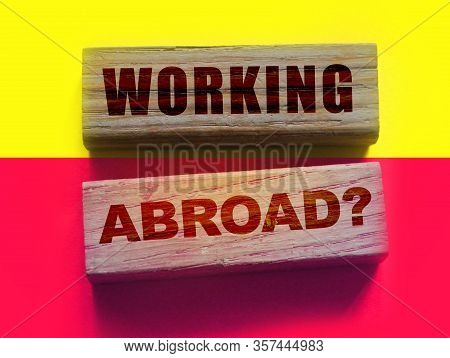 Working Abroad Words On Wooden Blocks. Business Human Resourses Hr Headhunting Concept