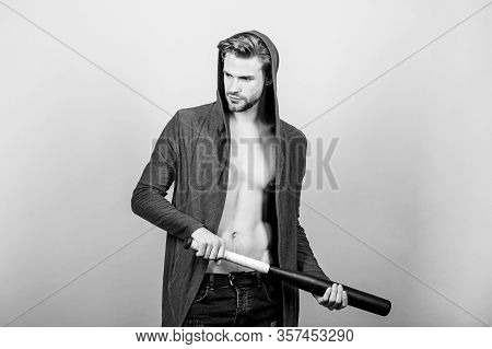 Hooligan Man Hits The Bat. Bandit Gang And Conflict. Aggression And Anger. Man With Baseball Bat. Se