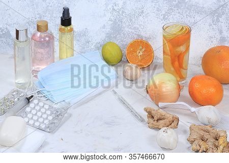 Hand Sanitizer Bottles, Medical Masks And Folk Immunostimulants, Vitamins. The Concept Of Coronaviru