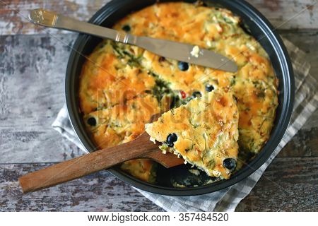 Selective Focus. Frying Pan With A Pie With Cabbage And Olives. Freshly Baked Homemade Cabbage Pie. 