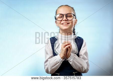 Cute Schoolgirl In Glasses Smile Implore Gesture