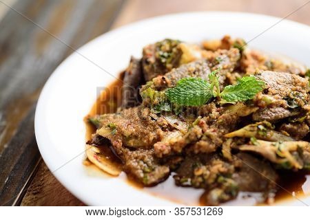 Local Thai Food (tub Wan), Spicy Pork Liver Salad On White Plate