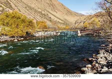 Kokemeren River, Mountain River In The Naryn Region Of Kyrgyzstan, Autumn Landscape