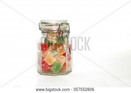 Glass Can Of Turkish Delight With Swing Stoppe Isolated On White Background. Image Contains Copy Spa