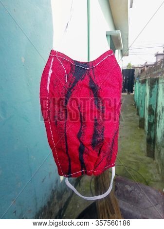 A Mask Of Cloths Kept For Dry At Home After Washing For Avoid/protect From Corona(covid-19)