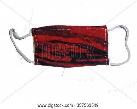 A Mask Of Cloths On The White Background