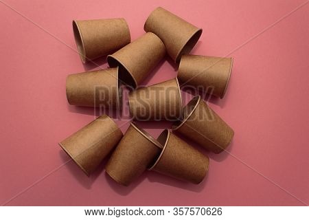 Craft Paper Cups For Coffee Or Any Drinks On A Pink Paper Background. Concept Of Ziro Waste, No Plas