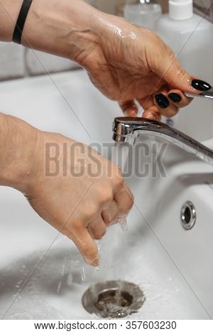Hand Hygiene. How To Wash Your Hands With Soap And Water. Women Washing Hands With Antibacterial Soa