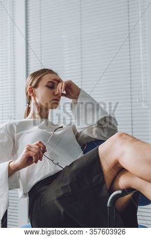 Young Business Woman Take It Easy Working And Resting In Office. Niksen, Do Nothing, Overwork, Life 