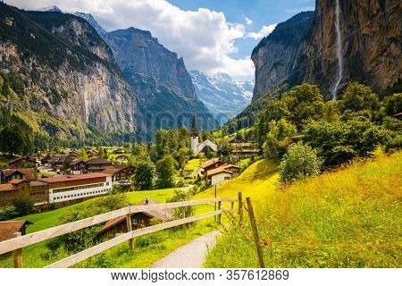 Summer view of alpine valley Lauterbrunnen. Location Swiss alp, Bernese Oberland, Europe. Staubbach waterfall is a famous tourist attraction. Popular place in the world. Discover the world of beauty.
