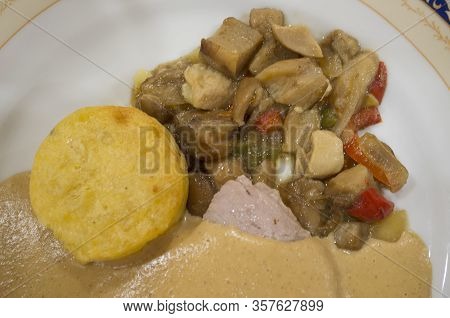 Sirloin Medallions In Juice With Garnished Boletus Sautéed And Potato Pie