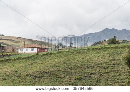 Aquitania, Boyaca / Colombia; April 8, 2018: Andean Landscape, Rural House Surrounded By Welsh Onion