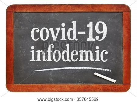Covid-19 Infodemic - Coronavirus Pandemic Information Overload Concept, White Chalk Text On A Vintag