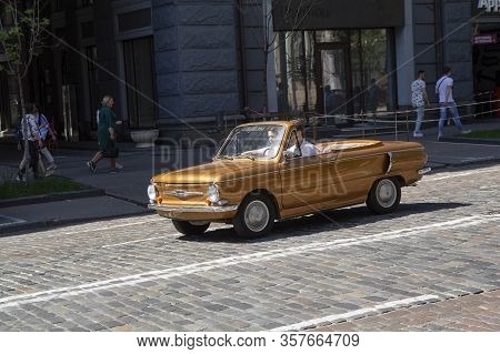 Kiev, Ukraine - May 19, 2019: Soviet-made Retro Car Zaz-968a Converted Into A Cabriolet On The City 
