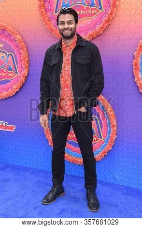 LOS ANGELES - MAR 07:  Asif Ali arrives for âMira, Royal Detectiveâ World Premiere on March 07, 2020 in Burbank, CA
