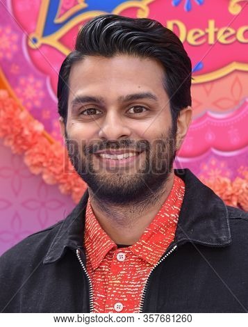 LOS ANGELES - MAR 07:  Asif Ali arrives for âMira, Royal Detectiveâ World Premiere on March 07, 2020 in Burbank, CA