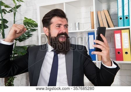Lost His Temper. Angry Broker Punch Smartphone. Bearded Man Got Angry With Sms Information. De-stres