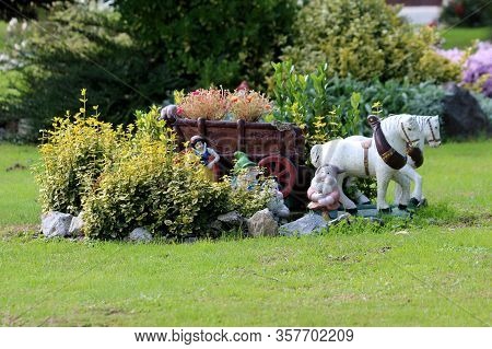 Beautiful Small Fairytale Garden Decorations From Horse And Carriage To Garden Gnomes Surrounded Wit