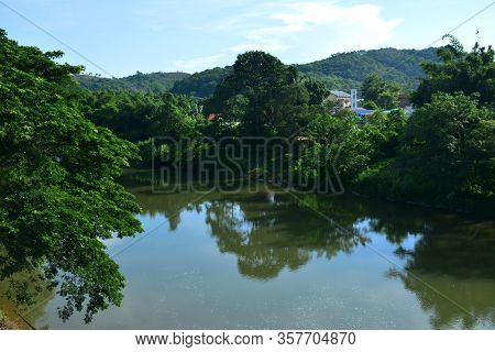 Tamparuli River With Mangroves In Sabah, Malaysia
