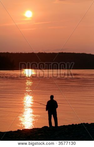 Fiskeri ved solnedgang