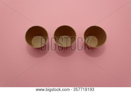 Craft Paper Cups For Coffee Or Any Drinks On A Pink Paper Background. Concept Of Ziro Waste, No Plas