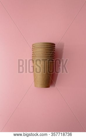 Craft Paper Cups For Coffee Or Any Drinks On A Pink Paper Background. Concept Of Ziro Waste, No Plas