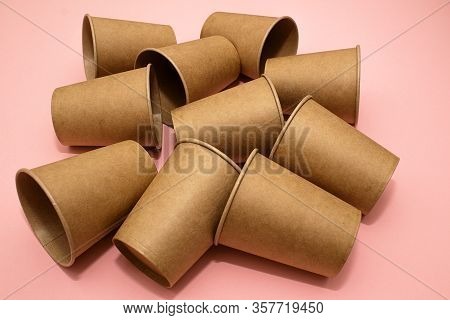 Craft Paper Cups For Coffee Or Any Drinks On A Pink Paper Background. Concept Of Ziro Waste, No Plas