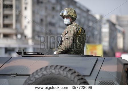 Bucharest, Romania - March 25, 2020: Romanian Army Was Called To Assist The Police In Enforcing A Fu