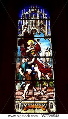 Paris, France. August 17, 2018. Stained Glass Window At Flamboyant Gothic Eglise Saint-severin Locat