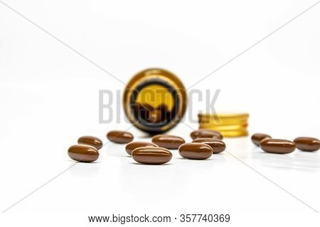 Multivitamin Softgel Capsules With Blurred Bottle And Cap