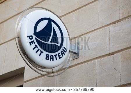 Bordeaux , Aquitaine / France - 11 25 2019 : Petit Bateau Kids Fashion Store Sign Small Boat Logo Sh