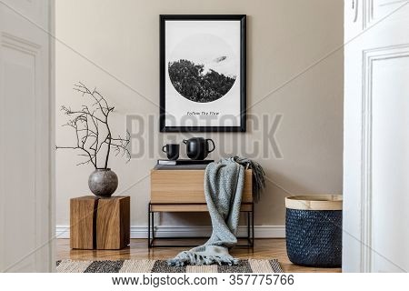 Modern Scandinavian Living Room Interior With Black Mock Up Poster Frame, Design Commode And Elegant