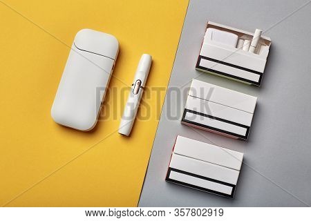 Electronic Cigarette Technology. Tobacco Iqos System. Close-up An Electric Hybrid Cigarette With A H