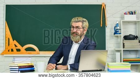 The Teacher The Legend. Senior Teacher Sit At School Desk. School Teacher Or Tutor. Schoolmaster. Te