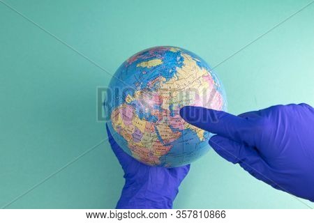 World Corona Virus Attack Concept. World Earth Put Mask To Fight Against Corona Virus. Concept Of Fi